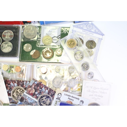 84 - A collection of mixed coins and banknotes to include proof and uncirculated world coin sets, Kenya h... 