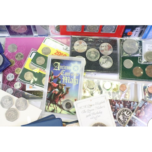 84 - A collection of mixed coins and banknotes to include proof and uncirculated world coin sets, Kenya h... 