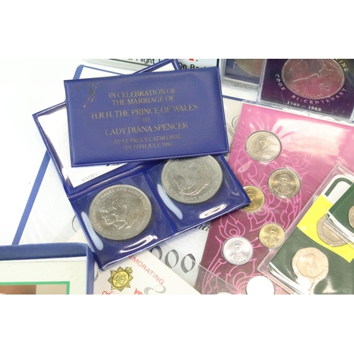 84 - A collection of mixed coins and banknotes to include proof and uncirculated world coin sets, Kenya h... 