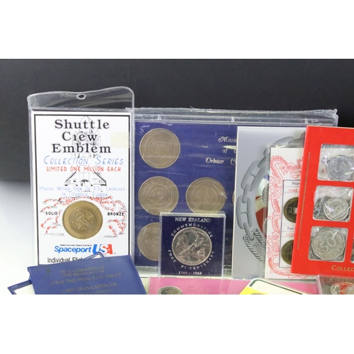 84 - A collection of mixed coins and banknotes to include proof and uncirculated world coin sets, Kenya h... 