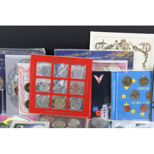 84 - A collection of mixed coins and banknotes to include proof and uncirculated world coin sets, Kenya h... 