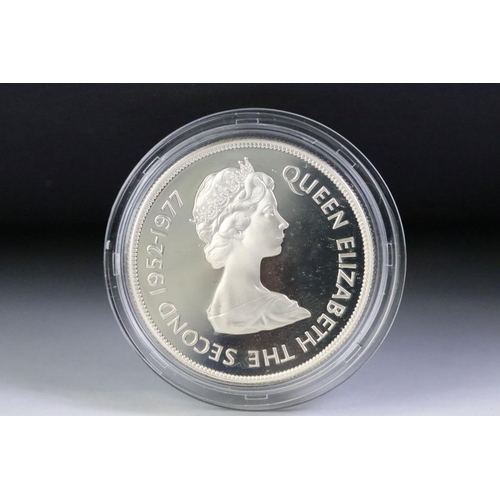 89 - A collection of four Royal Mint silver proof commemorative crowns to include 3 x 1977 silver jubilee... 