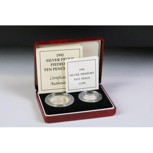 90 - A collection of four silver proof coin sets to include the 2013 Coronation Britannia silver crown, 1... 