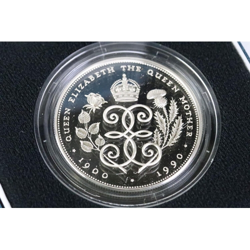 90 - A collection of four silver proof coin sets to include the 2013 Coronation Britannia silver crown, 1... 