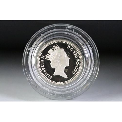 90 - A collection of four silver proof coin sets to include the 2013 Coronation Britannia silver crown, 1... 