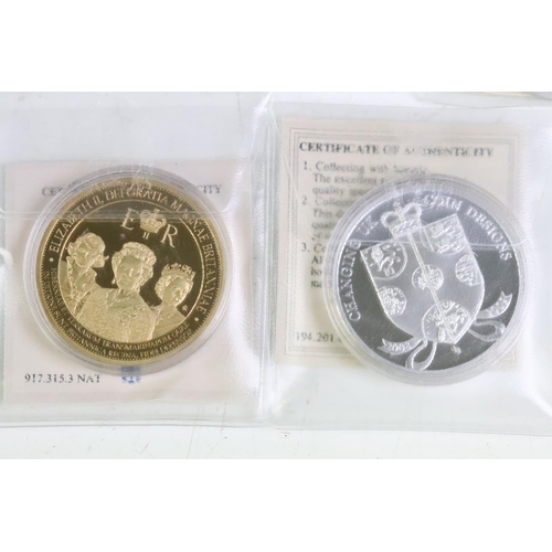 96 - A large collection of proof collectors coins to include many gold plated examples, mostly complete w... 