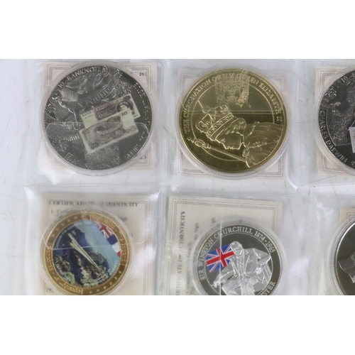 96 - A large collection of proof collectors coins to include many gold plated examples, mostly complete w... 