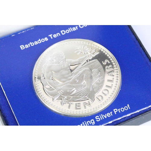 98 - A small collection of commemorative coin and medallions to include Queen Victoria bronze and silver ... 