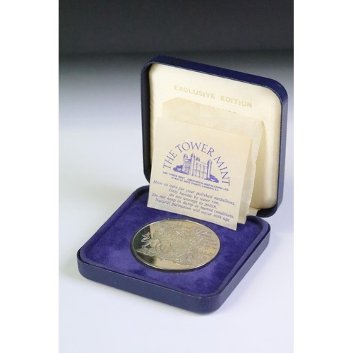 98 - A small collection of commemorative coin and medallions to include Queen Victoria bronze and silver ... 