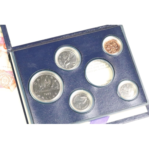 210 - A small collection of British and World coins to include Commemorative and uncirculated examples tog... 