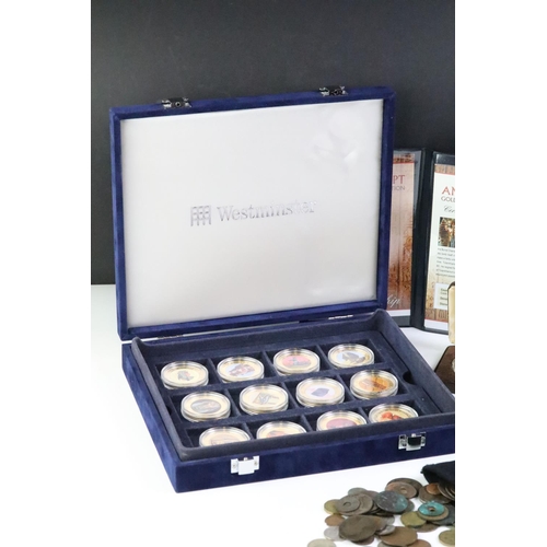 214 - A collection of Egypt commemorative coins encapsulated and within display case together with a selec... 