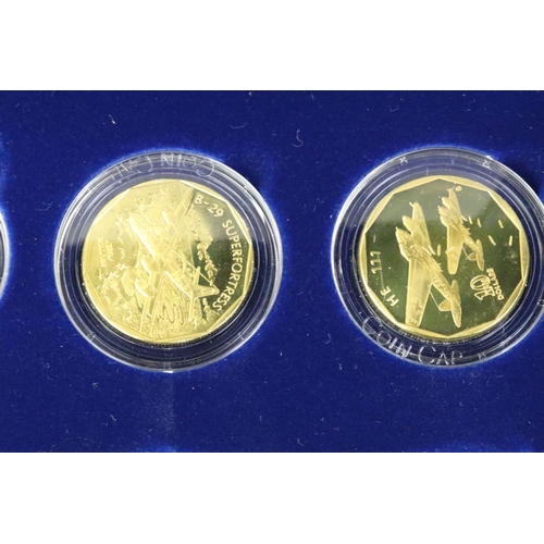 217 - A collection of uncirculated commemorative proof coins to include a cased set of Legendary Aircraft ... 