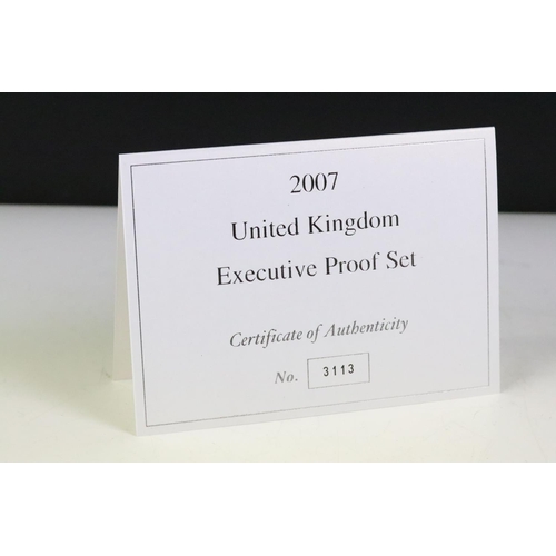 218 - A Royal Mint United Kingdom 2007 executive proof coin set, encased within wooden display case and co... 