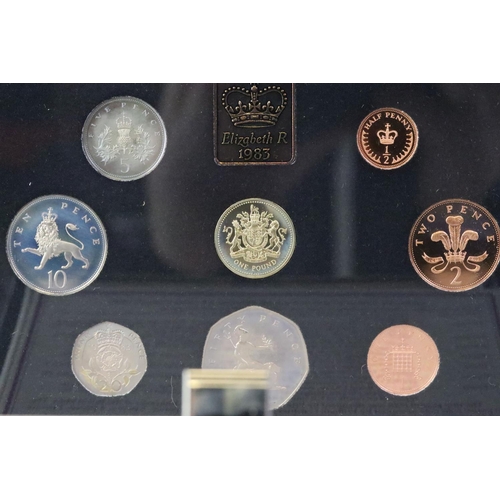 228 - A collection of six United Kingdom Royal Mint proof coin year sets to include 1985, 1984, 1983, 1997... 