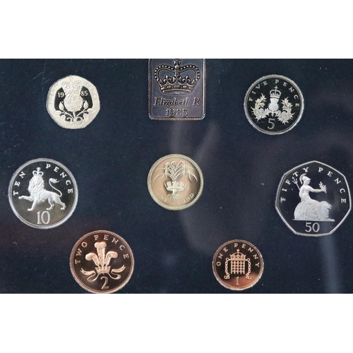 228 - A collection of six United Kingdom Royal Mint proof coin year sets to include 1985, 1984, 1983, 1997... 