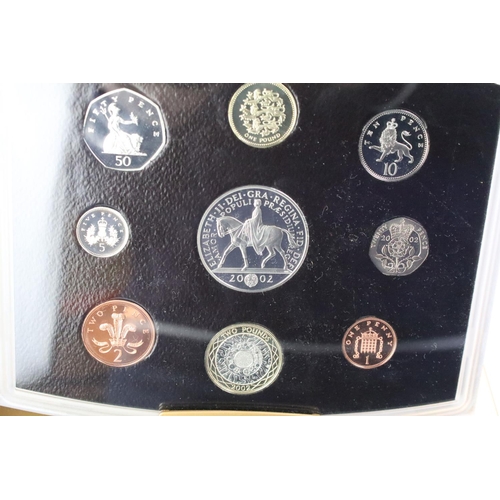 246 - A collection of four Royal Mint United Kingdom annual proof coin year sets to include 2011, 2004, 20... 