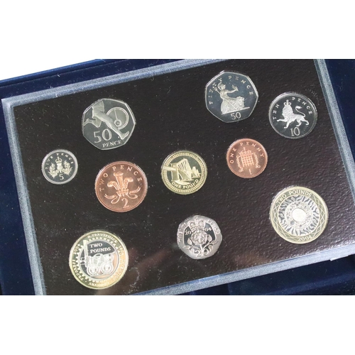 246 - A collection of four Royal Mint United Kingdom annual proof coin year sets to include 2011, 2004, 20... 