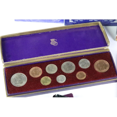 247 - A collection of Royal Mint coin sets to include five year sets and three crown sets together with tw... 