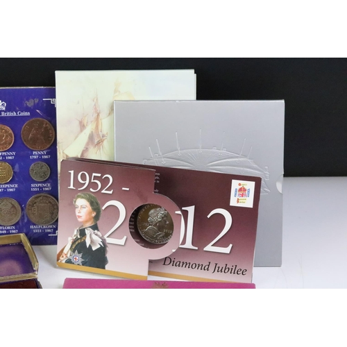 247 - A collection of Royal Mint coin sets to include five year sets and three crown sets together with tw... 