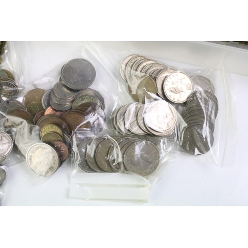 248 - A collection of British pre decimal and world coins to include some silver examples.