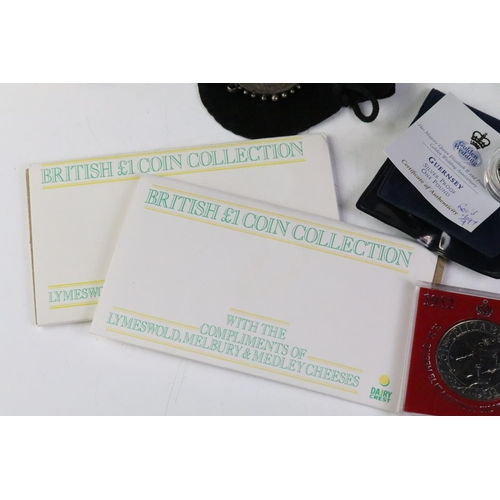 249 - A collection of mainly British commemorative coins to include Crowns, £1 and £5 examples together wi... 