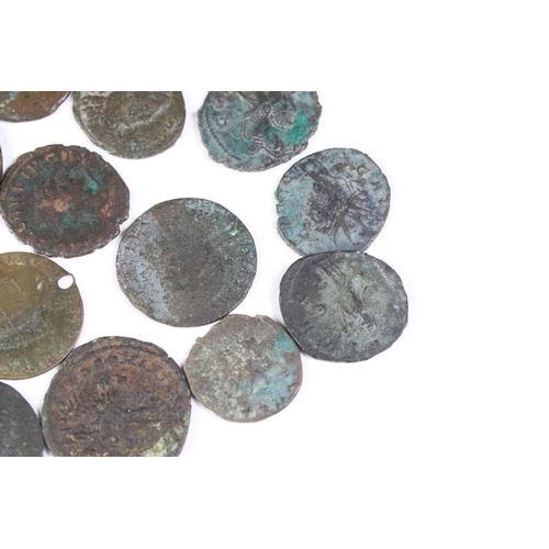 252 - A small collection of Bronze & copper coins to include a selection of Roman examples.