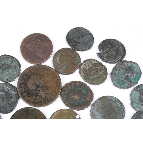 252 - A small collection of Bronze & copper coins to include a selection of Roman examples.