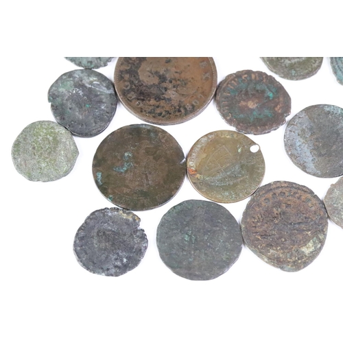 252 - A small collection of Bronze & copper coins to include a selection of Roman examples.