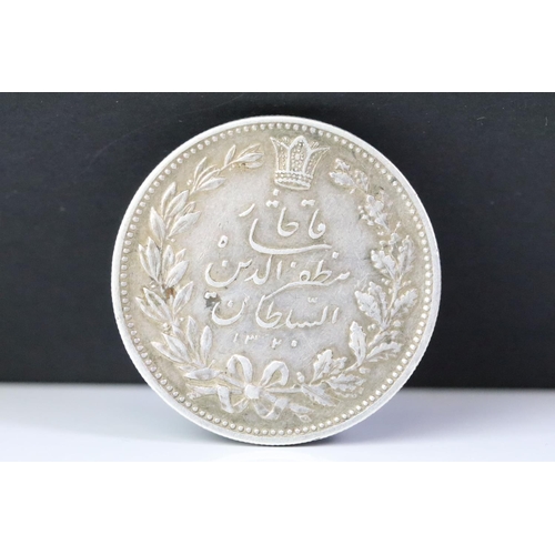 256 - An Iran 1902 5000 Dinar silver coin.