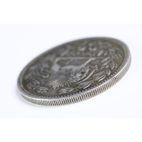 256 - An Iran 1902 5000 Dinar silver coin.