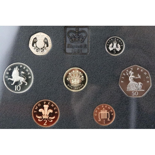 268 - A collection of six Royal Mint annual proof coin year sets to include 1983, 1984, 1990, 1991, 1992 a... 