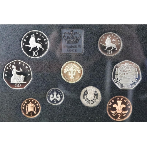 268 - A collection of six Royal Mint annual proof coin year sets to include 1983, 1984, 1990, 1991, 1992 a... 