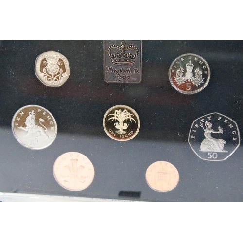 278 - A collection of six Royal Mint United Kingdom annual coin proof sets to include 1985, 1996, 1997, 19... 