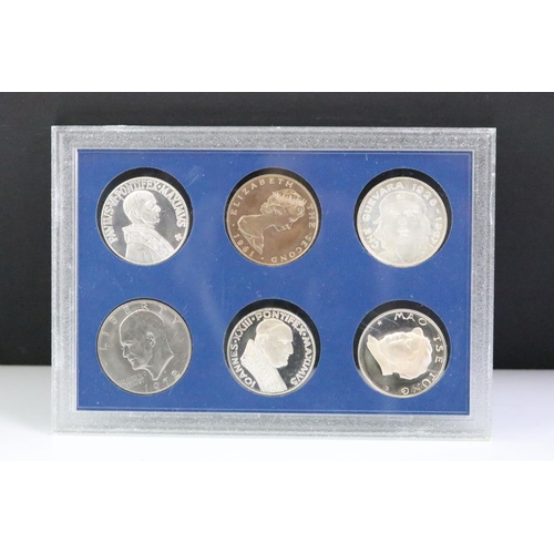 294 - A collection of coins within six plastic display cases to include pre decimal silver crowns.