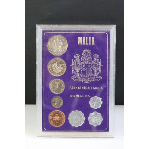 294 - A collection of coins within six plastic display cases to include pre decimal silver crowns.