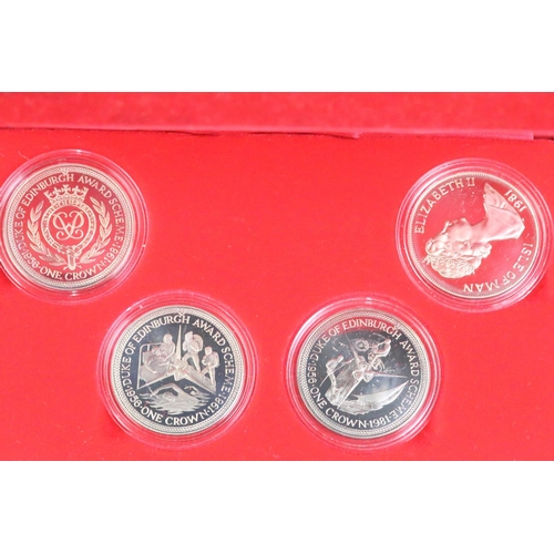 296 - A collection of Pobjoy Mint Isle of Man coin sets to include Crown sets, decimal coin set, Classic T... 