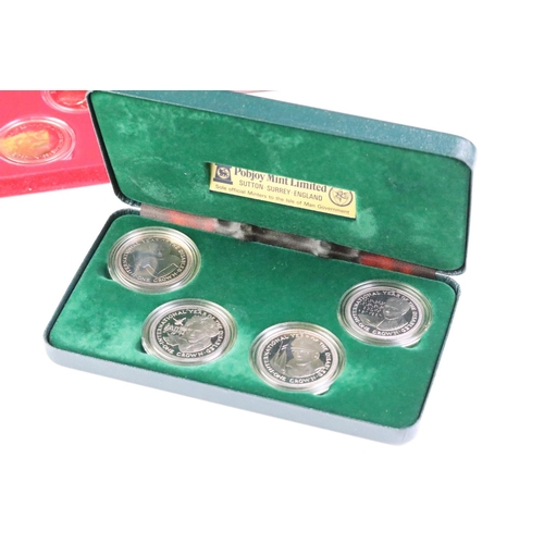 296 - A collection of Pobjoy Mint Isle of Man coin sets to include Crown sets, decimal coin set, Classic T... 