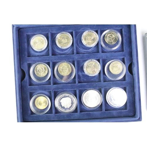 298 - A mixed collection of British and world coins to include a quantity of pre decimal silver and commem... 