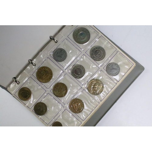 298 - A mixed collection of British and world coins to include a quantity of pre decimal silver and commem... 