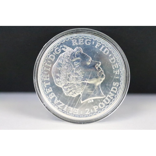 16 - A 2008 Britannia fine silver one ounce coin together with a United States 2007 one ounce fine silver... 