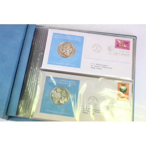 19 - A collection of ten United Nations silver proof coin covers contained within three albums.