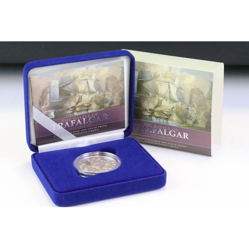 111 - A collection of four Royal Mint United Kingdom silver proof crown coins to include 2005 Battle of Tr... 