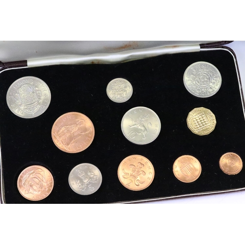 128 - A collection of coins to include a 1966 Queen Elizabeth II cased specimen set, 1968 first & second i... 