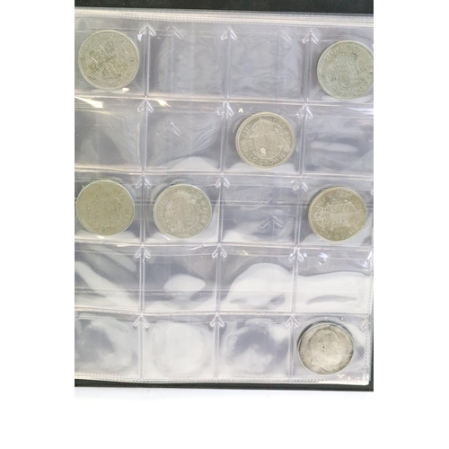 147 - A collection of mainly British pre decimal coins contained within two collectors albums to include s... 