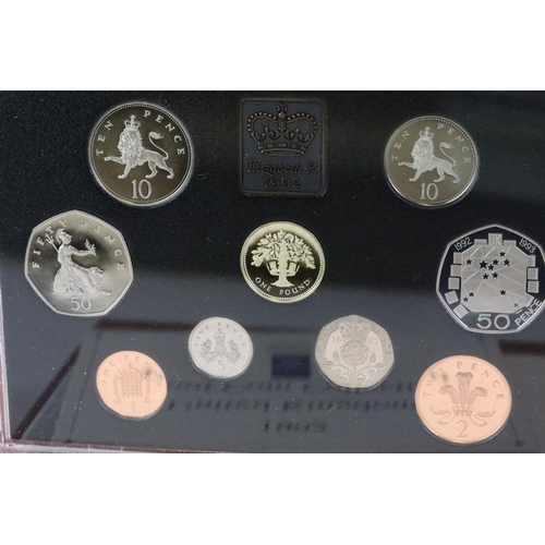 51 - A collection of seven Royal Mint uncirculated proof year sets to include 1997, 1999, 1998, 1996, 199... 