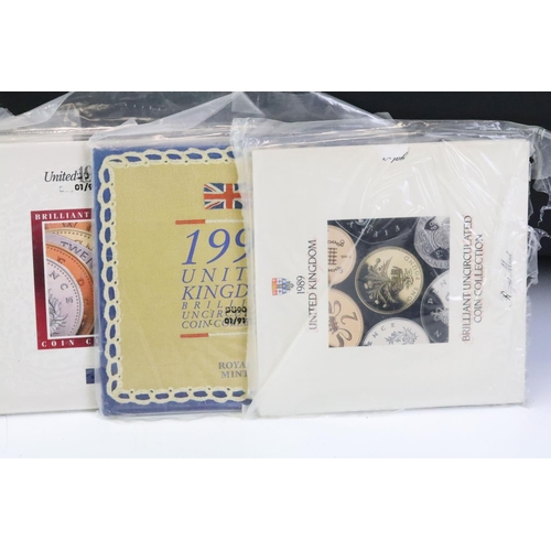 56 - A collection of twelve Royal Mint brilliant uncirculated coin year sets to include 2000, 1995, 1991,... 