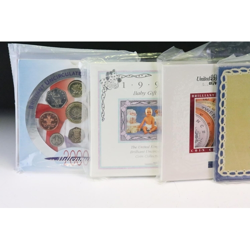 56 - A collection of twelve Royal Mint brilliant uncirculated coin year sets to include 2000, 1995, 1991,... 