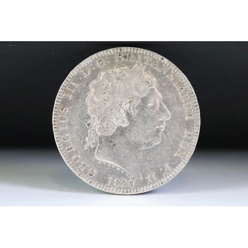 61 - A British King George III early milled 1820 silver full crown coin.