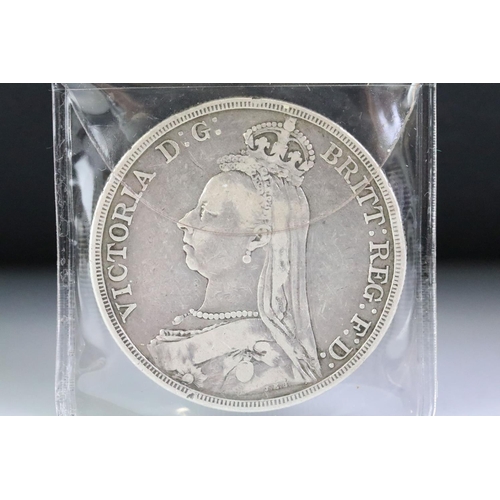 64 - Two British Queen Victoria (Jubilee Head) silver full crown coins to include 1888 and 1887 examples.