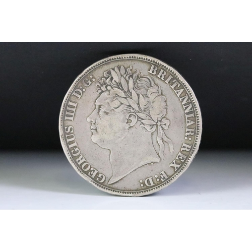 67 - A British Queen Victoria 1892 silver full crown coin together with a King George IIII 1821 example.